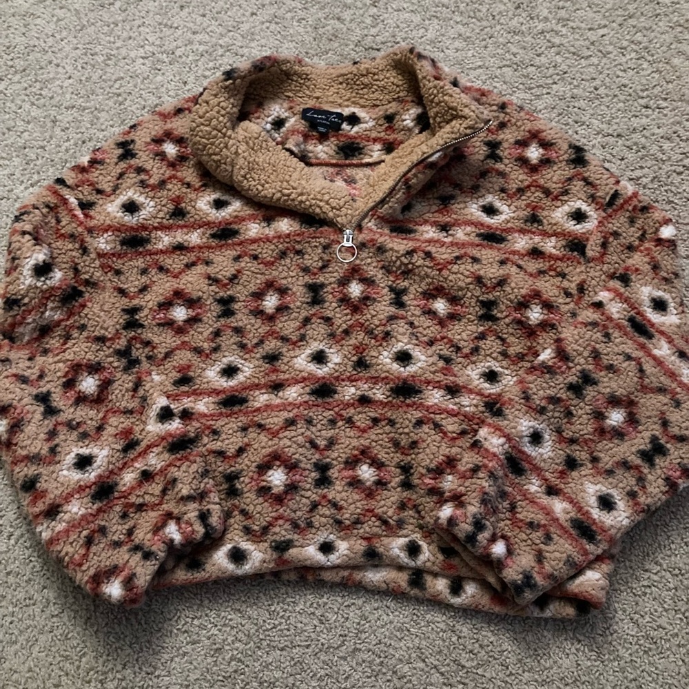 Comfy, fluffy cropped crew neck half zip up!